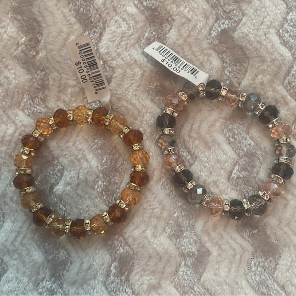 2 NWT crystal bead bracelets. One is amber colored other is ink gray and clear - Picture 2 of 4